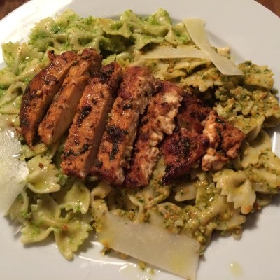 Arugula Pesto Bowtie Pasta Topped With Grilled Blackened Chicken