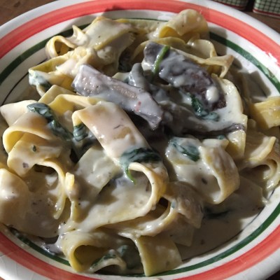 Pappardelle And Portobello Mushrooms In A Garlic Cream Sauce